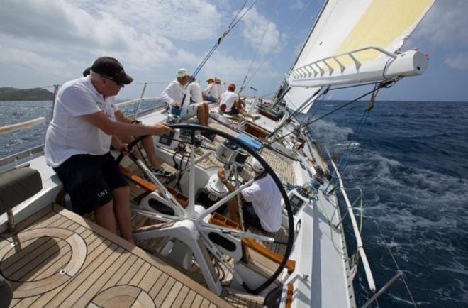 Racing at Antigua Sailing Week last year, Roland Pieper at the helm of Kialoa III - one of the most well known of  Jim Kilroy's Maxi yachts - RORC Caribbean 600 © Digby Fox